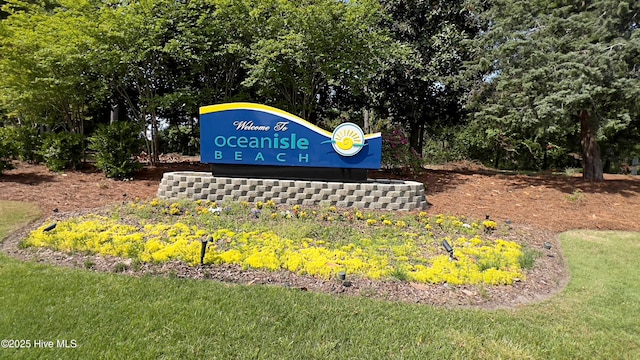 6445 Figure Eight Dr SW, Ocean Isle Beach, NC 28469 - community / neighborhood sign featuring a lawn