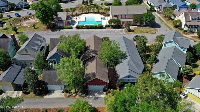 6445 Figure Eight Dr SW, Ocean Isle Beach, NC 28469 - aerial perspective of suburban area featuring a pool area