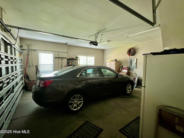7473 Balmore Dr SW, Sunset Beach, NC 28468 - garage with electric panel and a garage door opener