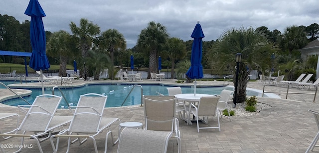 7473 Balmore Dr SW, Sunset Beach, NC 28468 - community pool featuring a patio