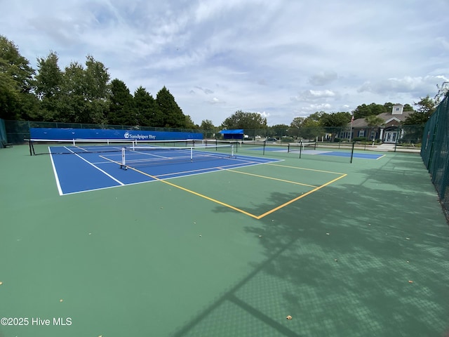 7473 Balmore Dr SW, Sunset Beach, NC 28468 - view of tennis court with community basketball court