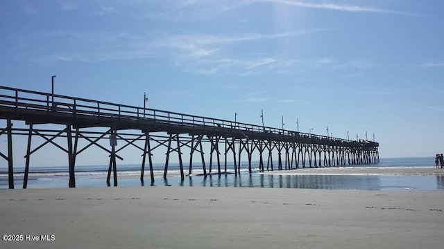 7473 Balmore Dr SW, Sunset Beach, NC 28468 - dock area with view of water and beach and a pier