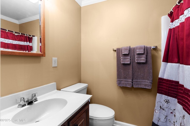 2714 W Beach Dr # 104, Oak Island, NC 28465 - bathroom featuring toilet, baseboards, vanity, and crown molding
