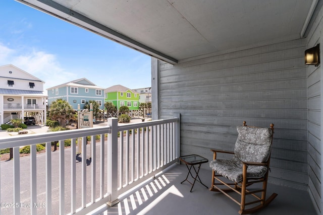 2714 W Beach Dr # 104, Oak Island, NC 28465 - balcony with a residential view