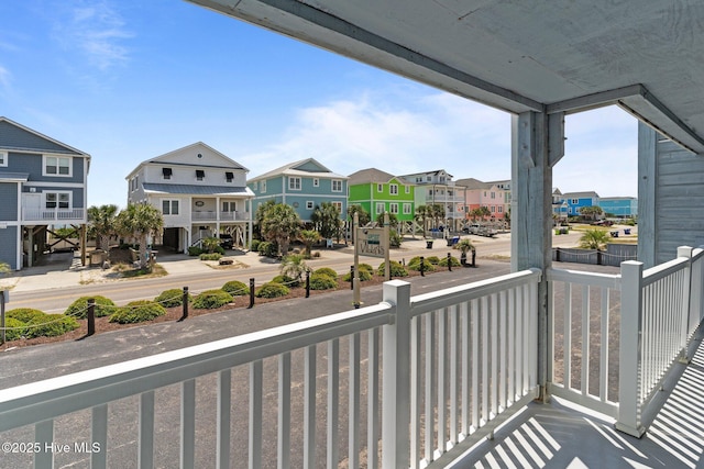 2714 W Beach Dr # 104, Oak Island, NC 28465 - balcony featuring a residential view