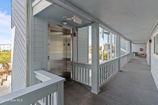 2714 W Beach Dr # 104, Oak Island, NC 28465 - doorway to property with elevator