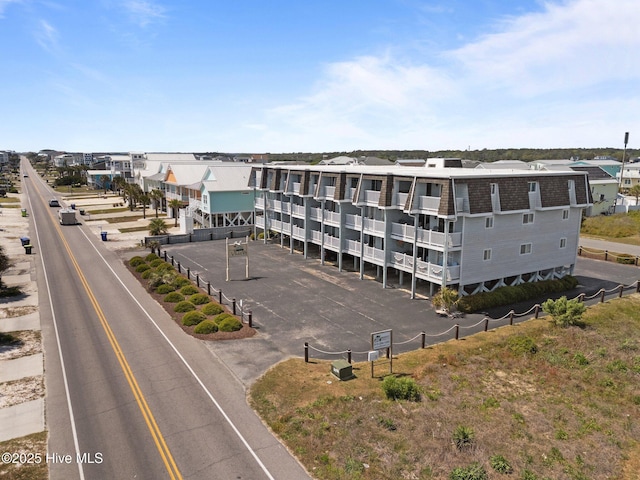 2714 W Beach Dr # 104, Oak Island, NC 28465 - drone / aerial view with a residential view