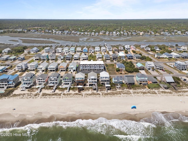 2714 W Beach Dr # 104, Oak Island, NC 28465 - bird's eye view featuring a view of the beach, a water view, and a residential view