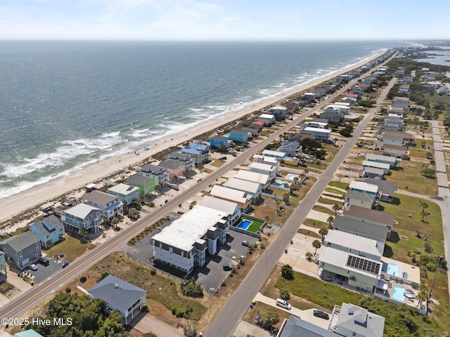 2714 W Beach Dr # 104, Oak Island, NC 28465 - birds eye view of property featuring a view of the beach and a water view