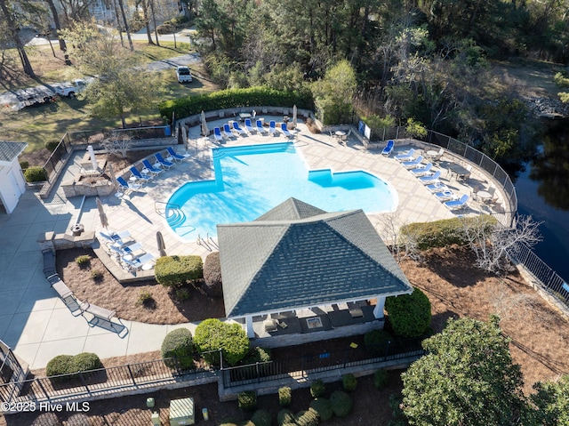 2537 St James Dr SE Apt 1003, Southport, NC 28461 - pool with fence and a patio area