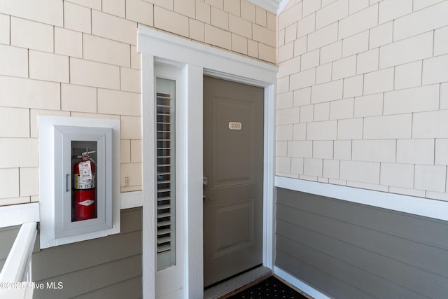 2537 St James Dr SE Apt 1003, Southport, NC 28461 - entrance to property featuring concrete block siding