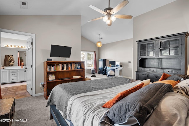 508 Commons Way, Wilmington, NC 28409 - bedroom with lofted ceiling, carpet flooring, and ensuite bathroom