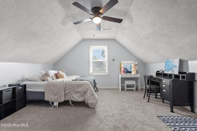 508 Commons Way, Wilmington, NC 28409 - carpeted bedroom with a textured ceiling, ceiling fan, and lofted ceiling