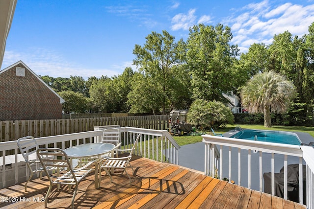 508 Commons Way, Wilmington, NC 28409 - deck with outdoor dining area and a fenced backyard
