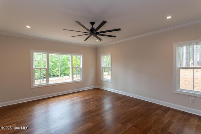 117 Banbridge Dr, West End, NC 27376 - spare room featuring ornamental molding, baseboards, dark wood-style floors, and recessed lighting