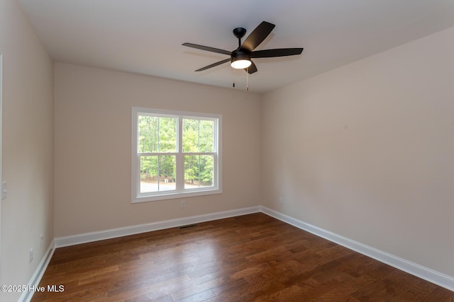 117 Banbridge Dr, West End, NC 27376 - empty room featuring visible vents, baseboards, a ceiling fan, and dark wood-style floors