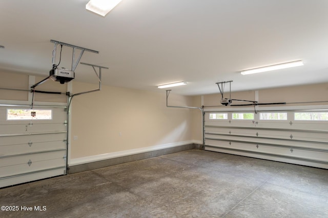 117 Banbridge Dr, West End, NC 27376 - garage featuring baseboards and a garage door opener