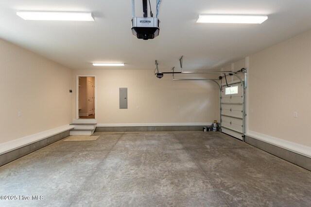 117 Banbridge Dr, West End, NC 27376 - garage featuring electric panel and a garage door opener