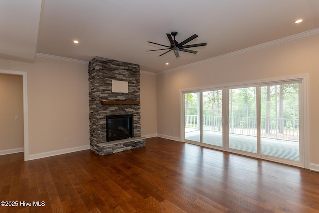 117 Banbridge Dr, West End, NC 27376 - unfurnished living room featuring ceiling fan, baseboards, a stone fireplace, and wood finished floors
