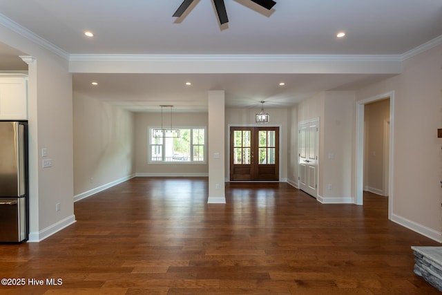 117 Banbridge Dr, West End, NC 27376 - unfurnished living room with baseboards, recessed lighting, crown molding, and dark wood-type flooring