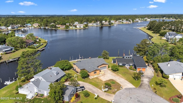 bird's eye view with a water view and a residential view