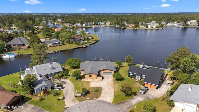 bird's eye view with a residential view and a water view