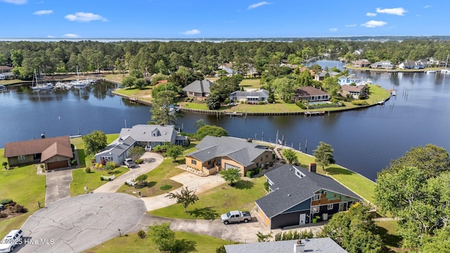 aerial view featuring a water view and a residential view