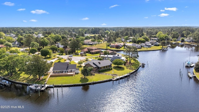 bird's eye view featuring a water view and a residential view