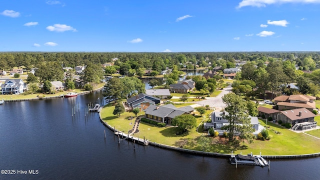 birds eye view of property with a water view and a residential view