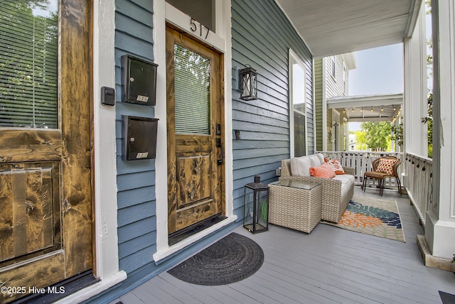property entrance featuring covered porch