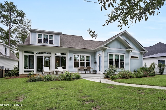 3726 White Cliffs Dr, Castle Hayne, NC 28429 - rear view of house featuring board and batten siding