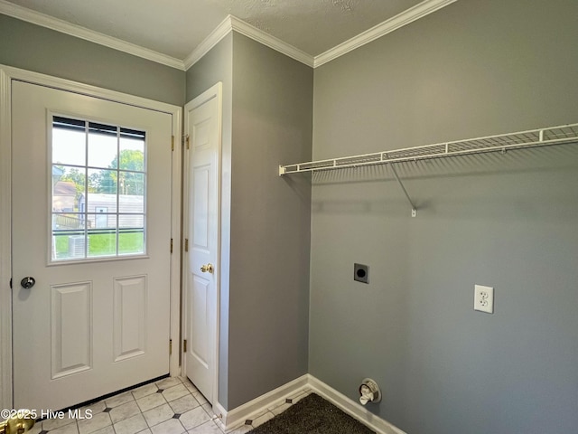 laundry area featuring electric dryer hookup, ornamental molding, laundry area, and baseboards