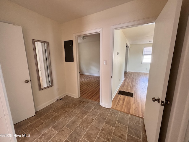 1010 Warren St, Clinton, NC 28328 - hall featuring electric panel and baseboards