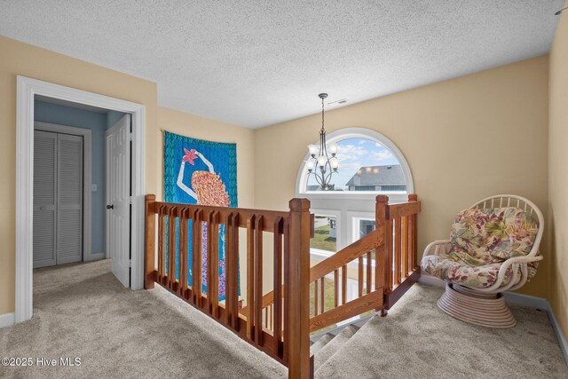 105 Island Quay Ct, Atlantic Beach, NC 28512 - interior space with carpet floors, baseboards, visible vents, and an inviting chandelier