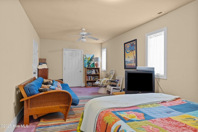105 Island Quay Ct, Atlantic Beach, NC 28512 - carpeted bedroom featuring ceiling fan, visible vents, and baseboards