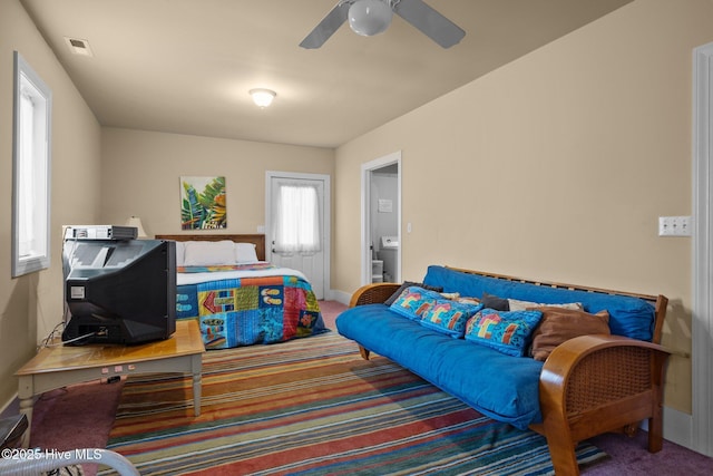 105 Island Quay Ct, Atlantic Beach, NC 28512 - living area featuring carpet flooring, baseboards, visible vents, and ceiling fan