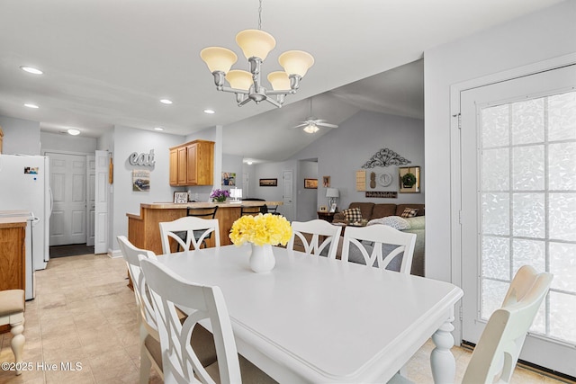 202 Two Oaks Ct, Newport, NC 28570 - dining room featuring recessed lighting, lofted ceiling, and ceiling fan with notable chandelier