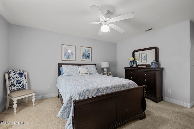 202 Two Oaks Ct, Newport, NC 28570 - bedroom with visible vents, ceiling fan, baseboards, and light carpet