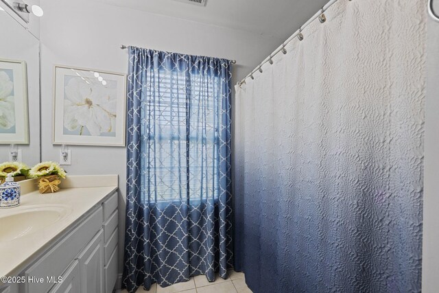 202 Two Oaks Ct, Newport, NC 28570 - bathroom featuring visible vents, tile patterned floors, and vanity