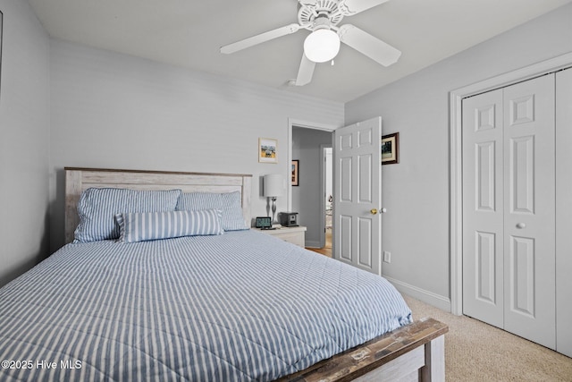 202 Two Oaks Ct, Newport, NC 28570 - carpeted bedroom with a closet, a ceiling fan, and baseboards