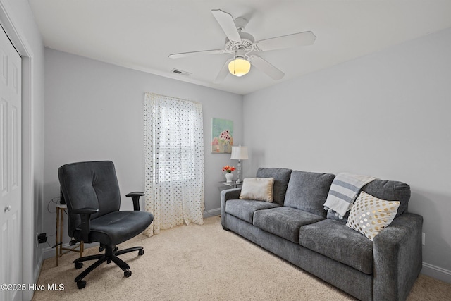 202 Two Oaks Ct, Newport, NC 28570 - living room with carpet, visible vents, baseboards, and ceiling fan