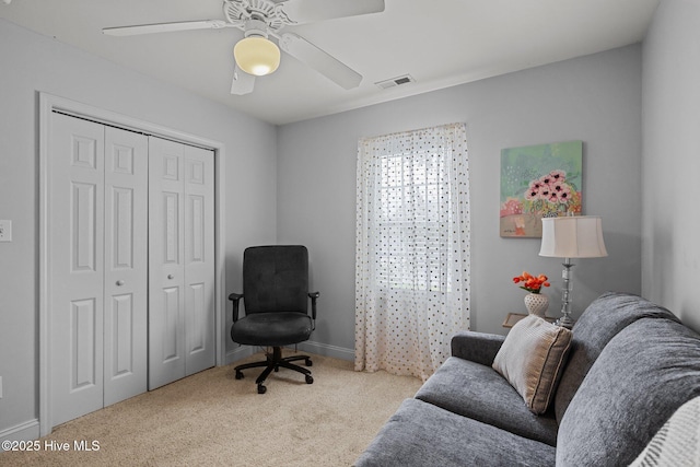 202 Two Oaks Ct, Newport, NC 28570 - living area with carpet floors, visible vents, a ceiling fan, and baseboards