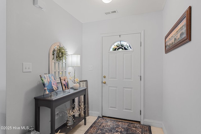 202 Two Oaks Ct, Newport, NC 28570 - entryway featuring baseboards, visible vents, and light tile patterned flooring