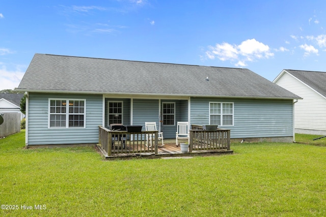 202 Two Oaks Ct, Newport, NC 28570 - rear view of house with a deck, a yard, and roof with shingles