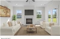 living room featuring a wealth of natural light, a fireplace, and recessed lighting