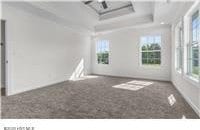 unfurnished room with a healthy amount of sunlight