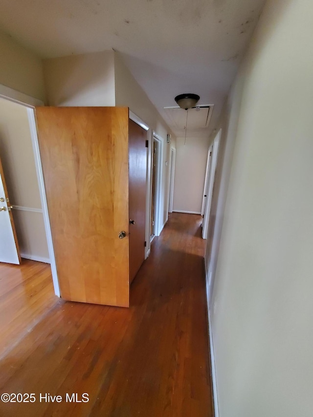 2703 Langston Dr, Goldsboro, NC 27534 - corridor featuring attic access and wood finished floors