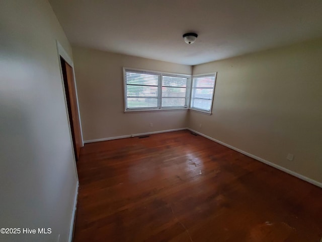 2703 Langston Dr, Goldsboro, NC 27534 - unfurnished room featuring baseboards and wood finished floors