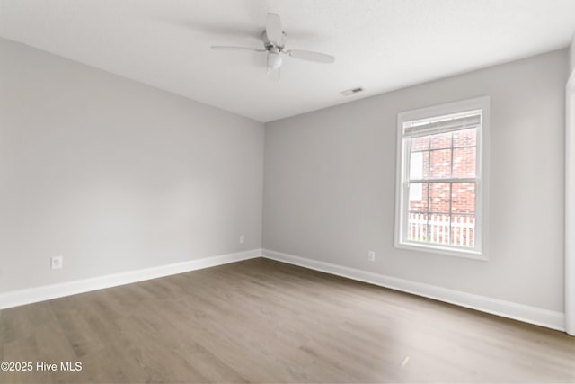 315 Whirlaway Blvd, Sneads Ferry, NC 28460 - empty room with wood finished floors, baseboards, and ceiling fan
