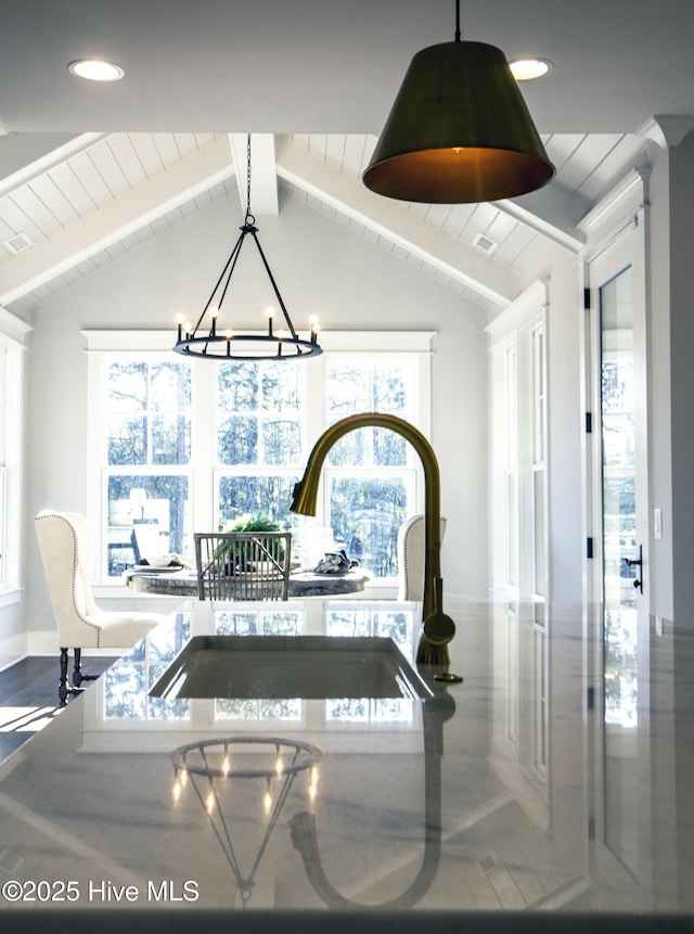 details with a sink, a chandelier, baseboards, beam ceiling, and recessed lighting